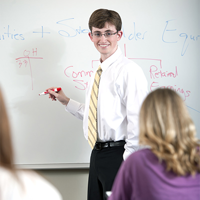 MBA professor with student