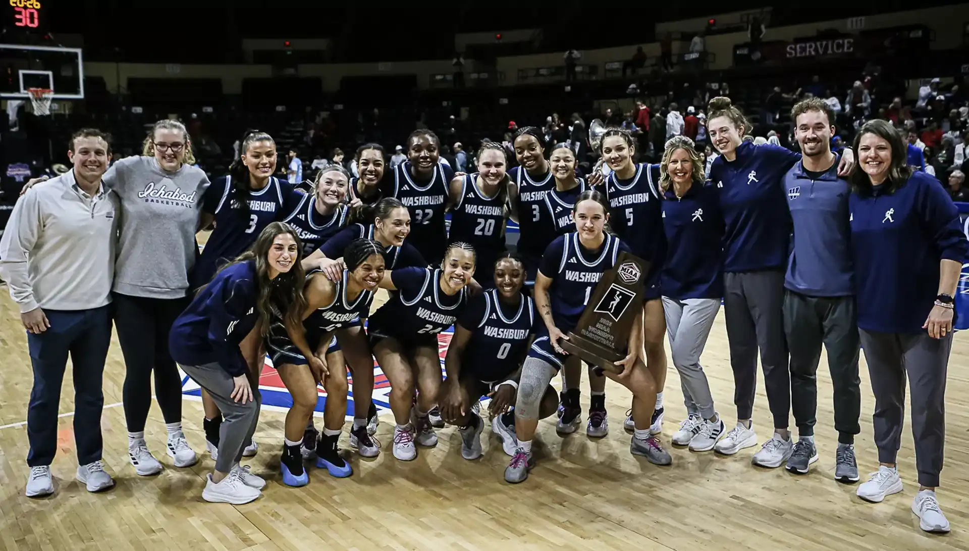 Students at Zoo Lights around a fire