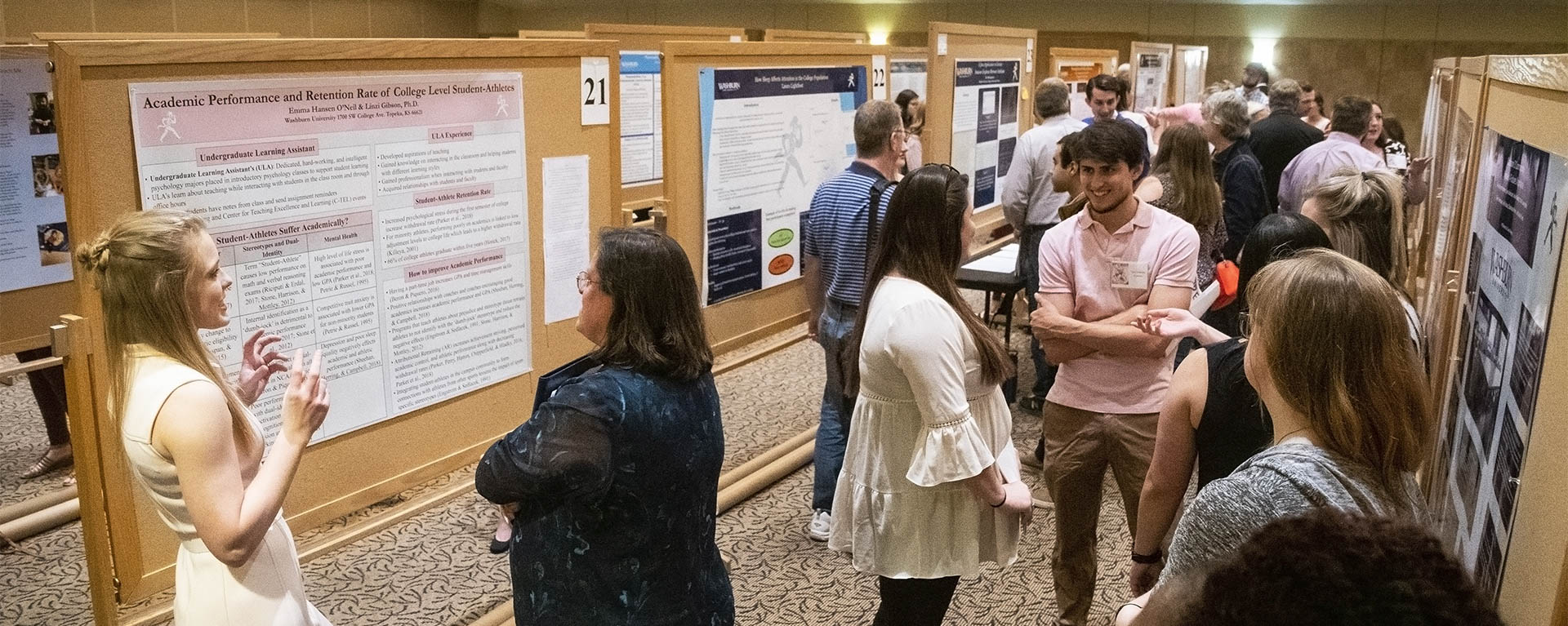 Student presenters and guests at the Apeiron poster session.