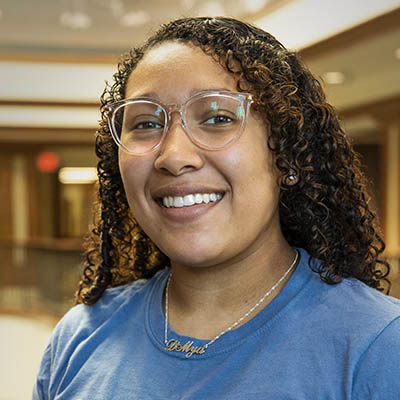 D'Mya, a Washburn student, smiles.