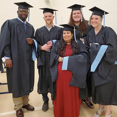 5 of the inaugural Limited Apprentice Program graduates at commencement.