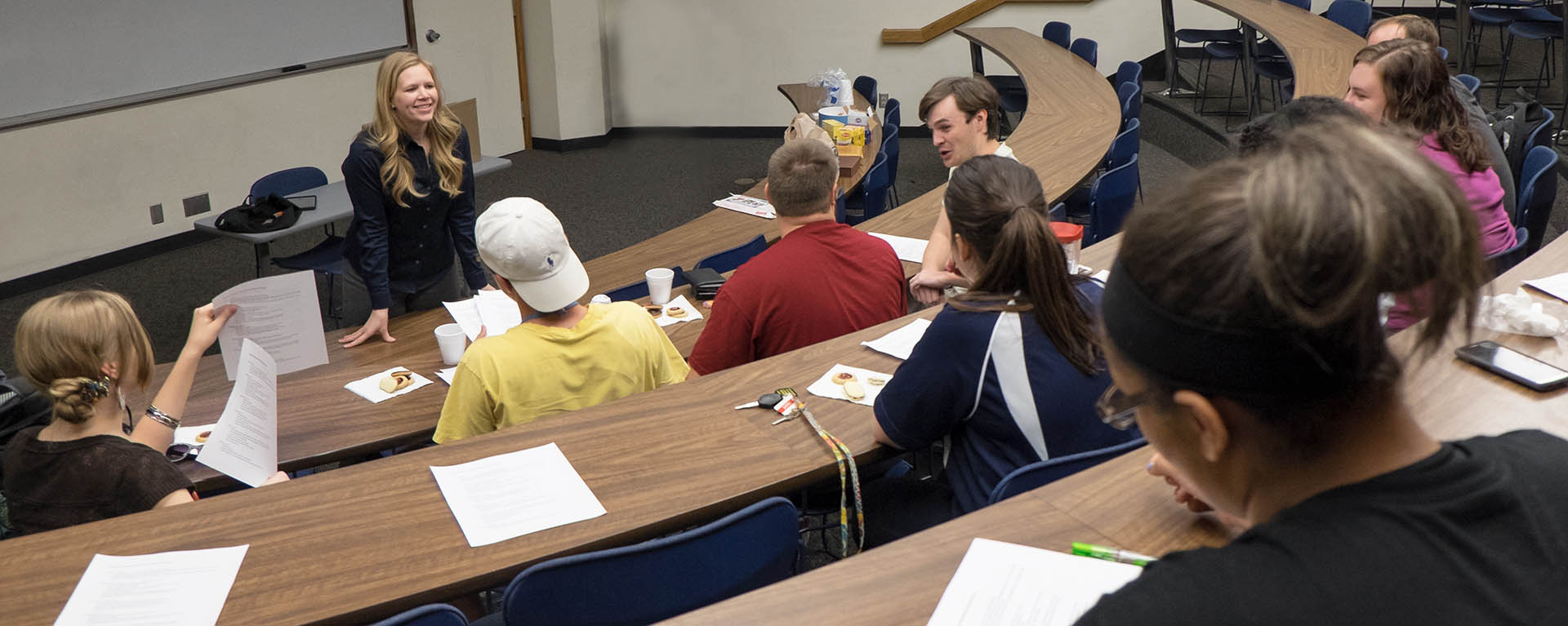 Students in classroom interacting with each other