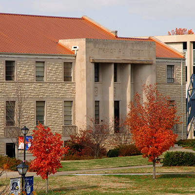 Memorial Union east entrance with fall trees.