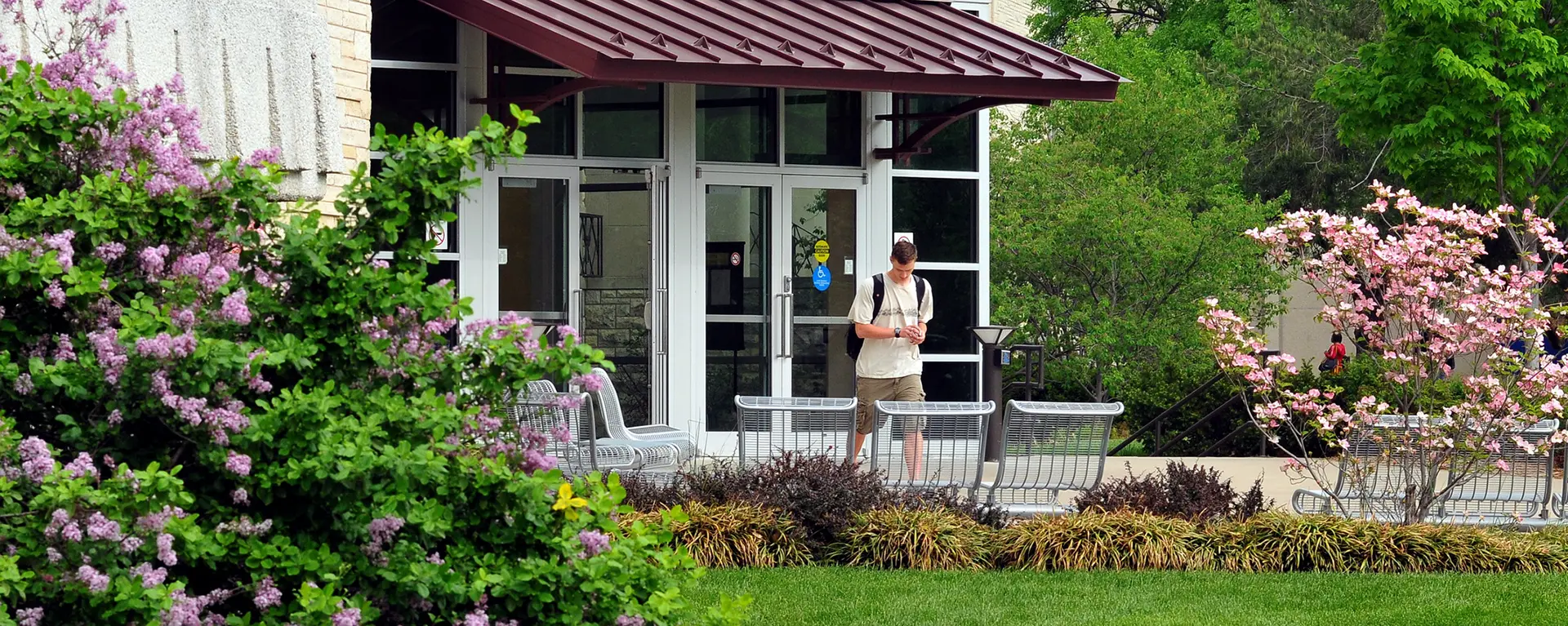 A student walks out of the memorial union.