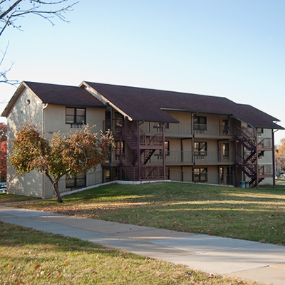 campus view of west hall exterior from the east