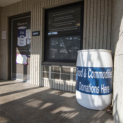 Bods Feeding Bods donation bins outside of their location in Kuehne Hall