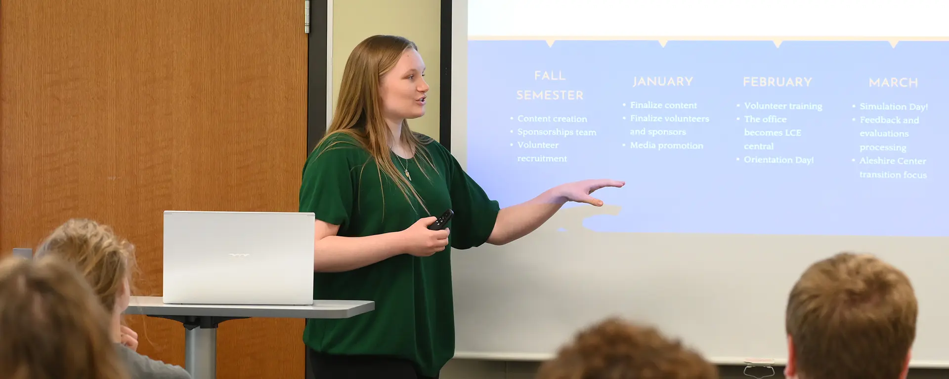 A leadership student presents their project to the class.