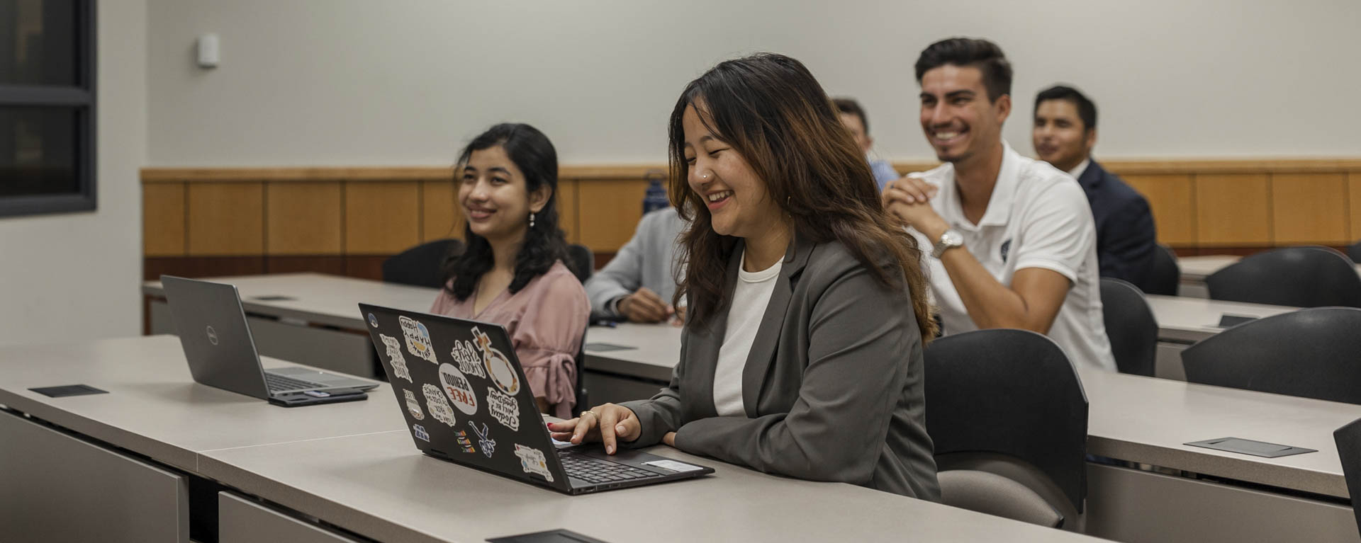 Students smiling in classroom