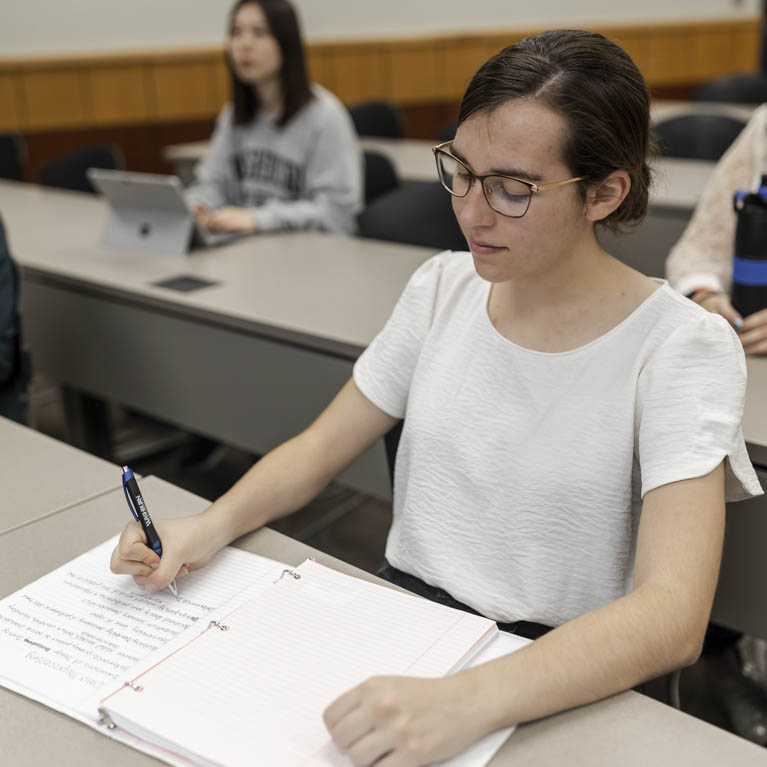 Student looking at financial documents