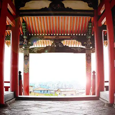 view from within a temple in Japan overlooking city