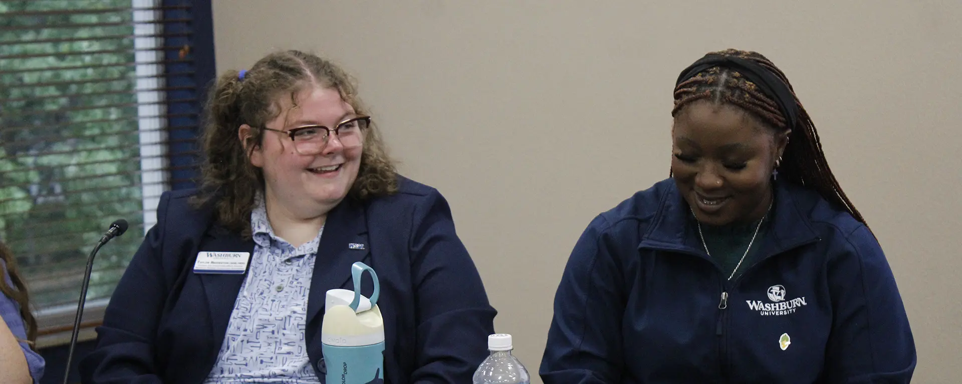 Two WSGA senators smile for a photo.